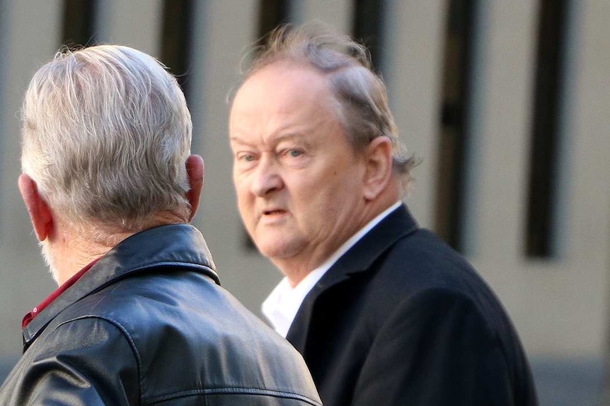 Martin Cooper with another man, leaving a Perth court.