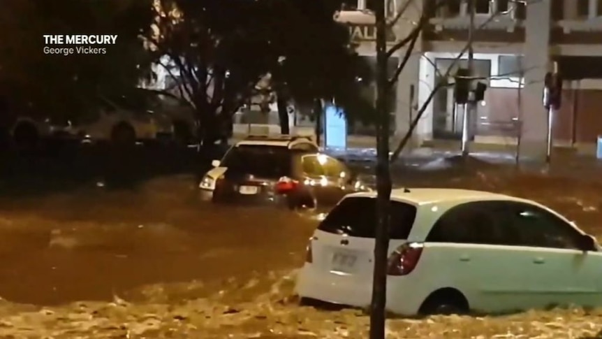 Flash floods tear through Hobart after record rain.