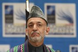 Hamid Karzai is under intense pressure to show he is serious about clamping down on corruption.