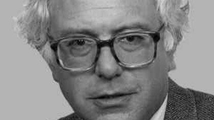 A black and white headshot of Bernie Sanders