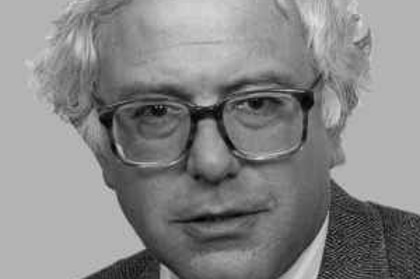 A black and white headshot of Bernie Sanders