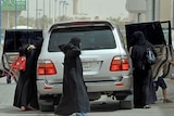 There is no law banning women from driving, but the interior ministry imposes regulations based on a fatwa.