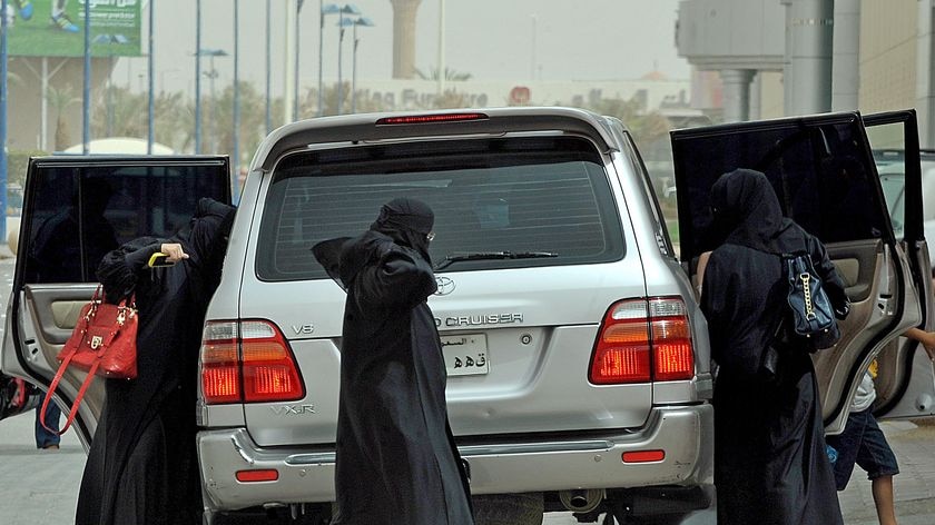 Saudi women get out of a Toyota four-wheel drive in Riyadh