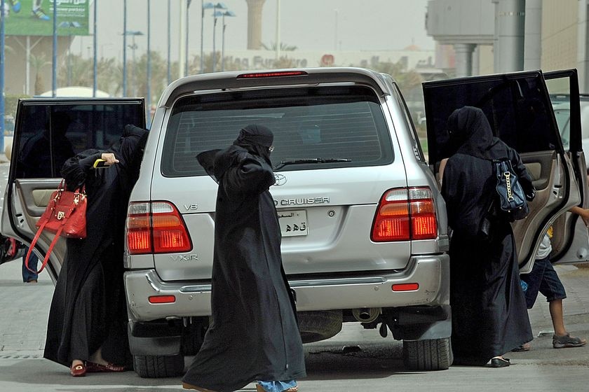 Saudi women get out of a Toyota four-wheel drive in Riyadh