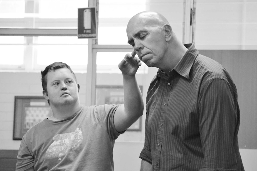 Director Clark Crystal (right) and performer Jamie Carrigan work hard to get it right.