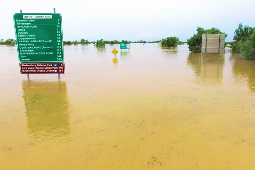 Drone footage of a flooded road near the central-west Queensland town of Winton.