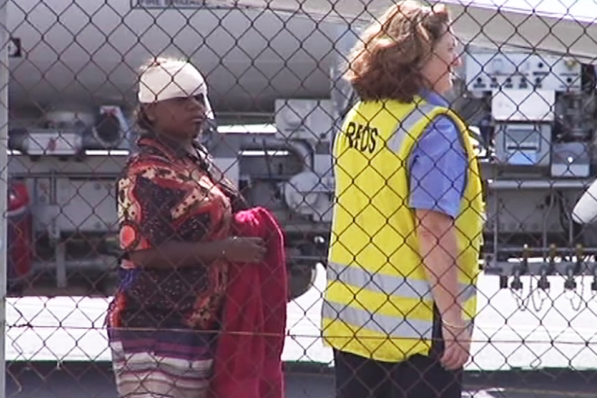 A woman injured in Kowanyama arriving in Cairns