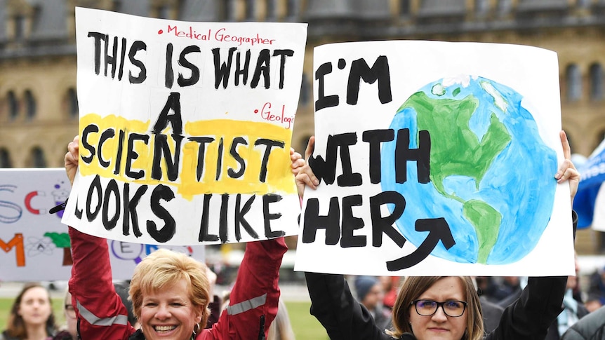 Two students participate in the March for Science on Parliament Hill in Canada
