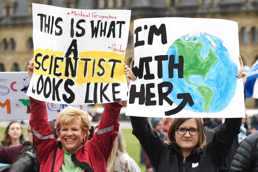 Two students participate in the March for Science on Parliament Hill in Canada