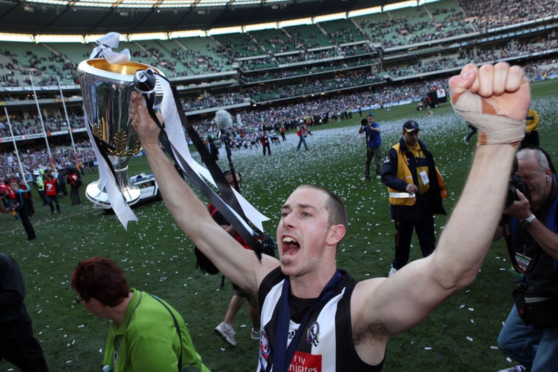 Nick Maxwell holds up the trophy after winning the 2010 AFL grand final replay against St Kilda at the MCG on October 2, 2010