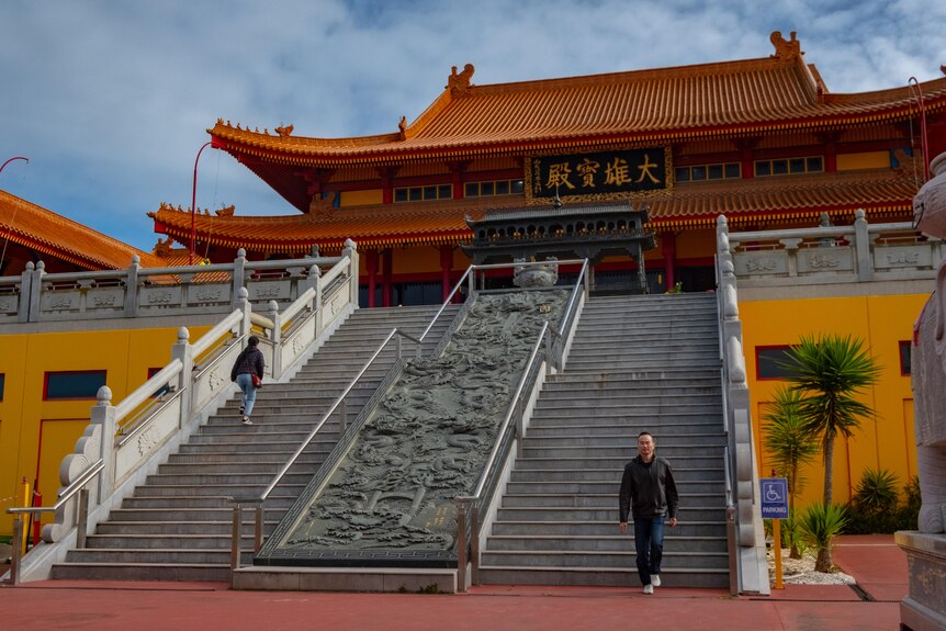 A photo of stairs outside the Chinese temple.