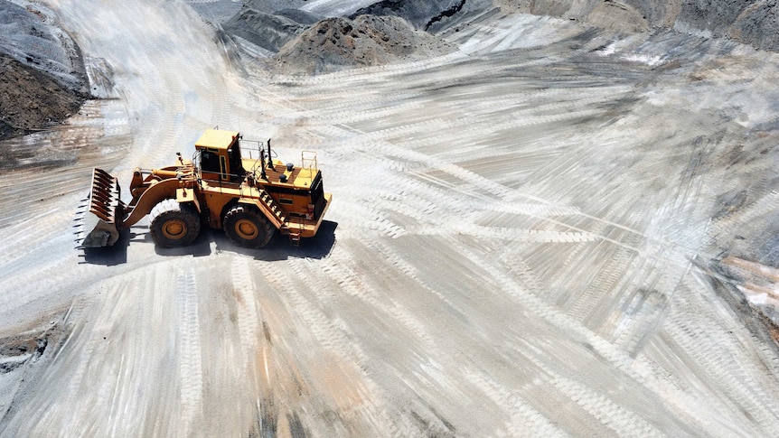 A front end loader in a mine site.