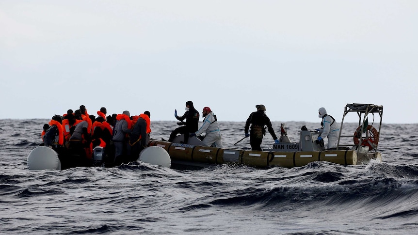 The Italian Navy is often deployed to rescue migrant boats in the Mediterranean Sea, like this group of asylum seekers in 2017.