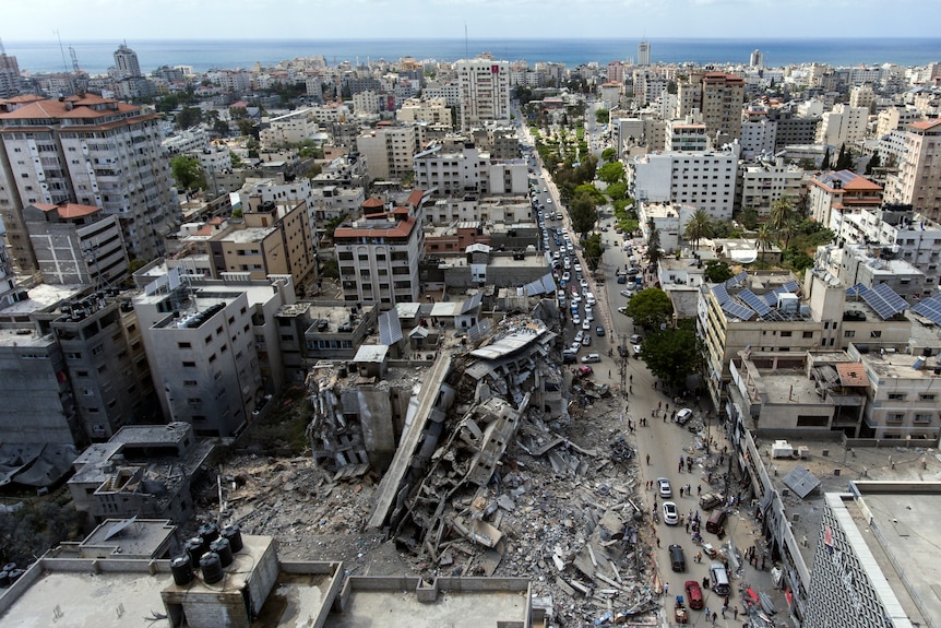 An aerial view of a destroyed building after it was hit by Israeli airstrikes