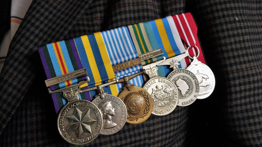 korean war medals on a jacket pocket