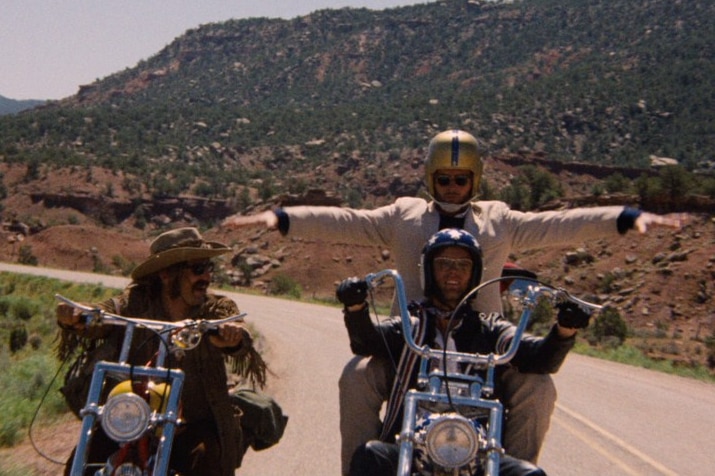 Dennis Hopper, Jack Nicholson and Peter Fonda on motorcycles in a scene from Easy Rider.