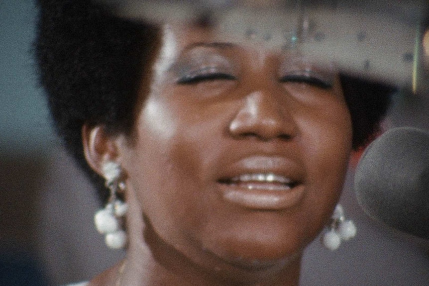 Close-up of singer Aretha Franklin from the film Amazing Grace