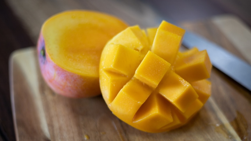 A mango cut open ready to eat.