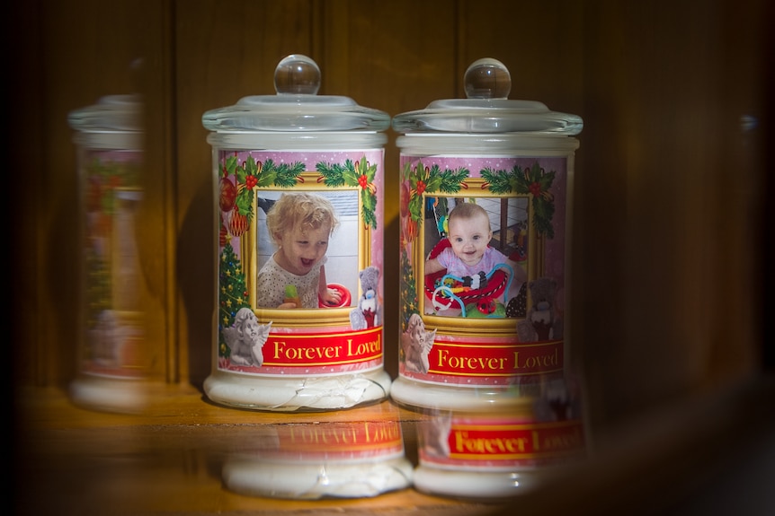 Urns containing Darcey and Chloe's ashes.