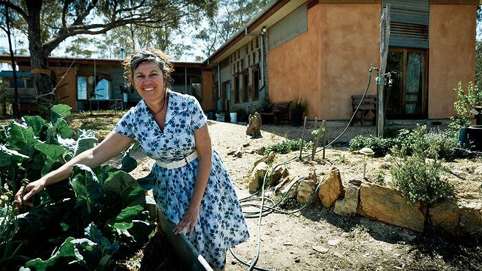 Ellen Madigan in the vegetable garden at the Murrnong co-housing community.