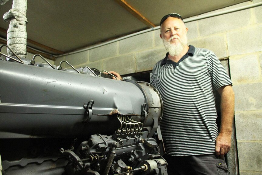 Alan Bidwell and his diesel generator that burns 200 litres of fuel a day
