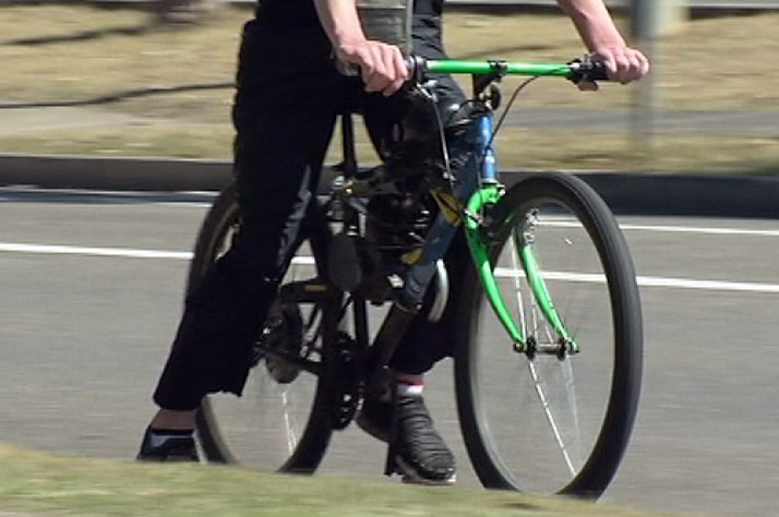 TV still of mechanised bicycle