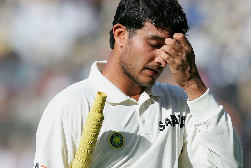 Surav Ganguly holds his head