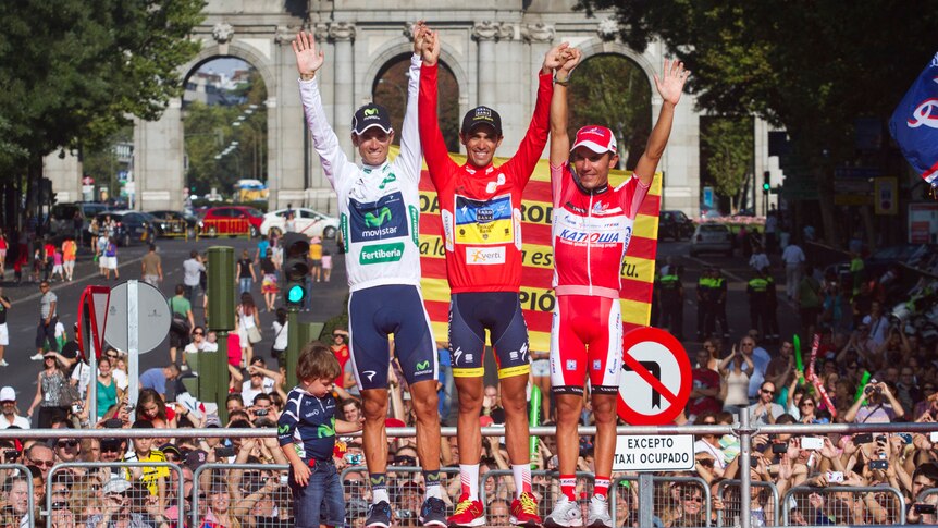 Contador celebrates on the podium
