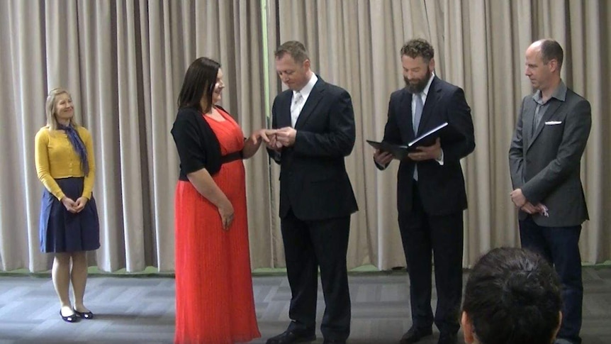 Tim Grimsey with his pretend bride and groom