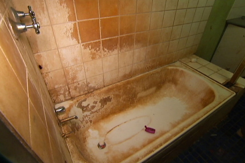 The squalid bathroom in a social housing property in a remote community.