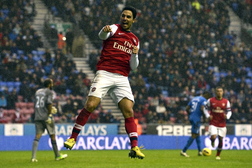 Arsenal's Mikel Arteta slotted home a penalty to put Arsenal up into third place.