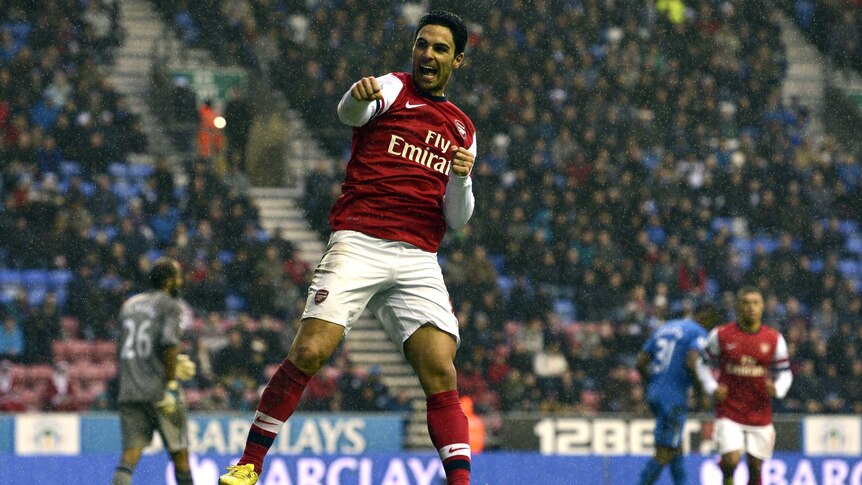 Arsenal's Mikel Arteta slotted home a penalty to put Arsenal up into third place.