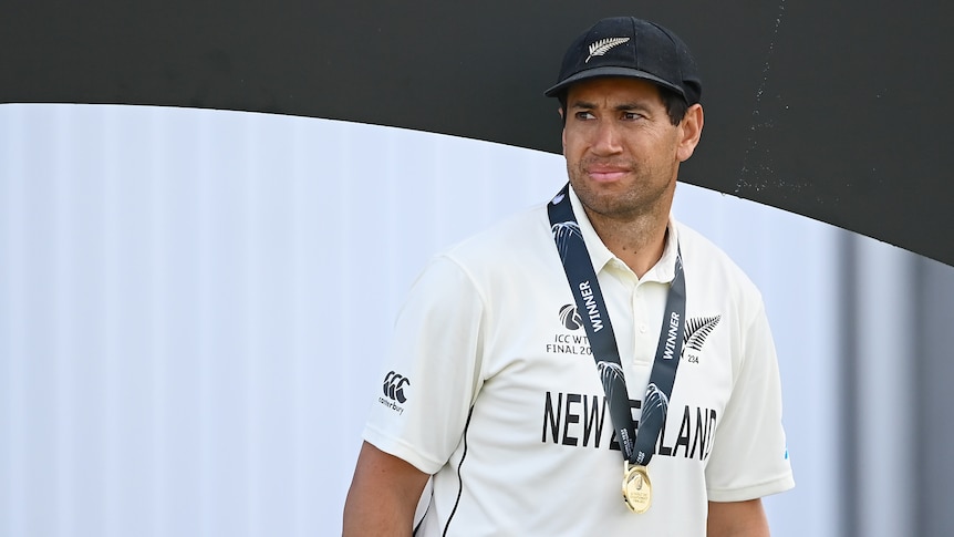 Ross Taylor looks into the distance after victory in the ICC World Test Championship. He is wearing a medal and cap
