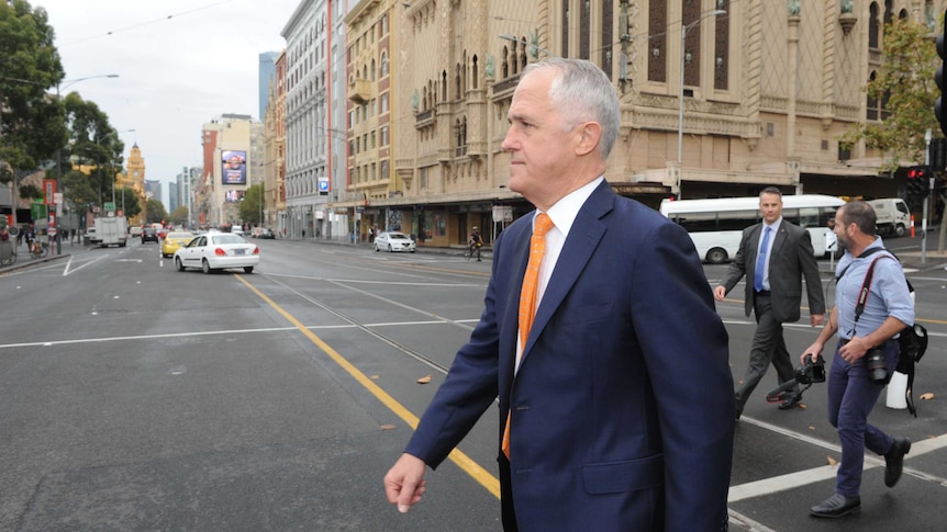 Malcolm Turnbull walks the street of melbourne, April 2016.