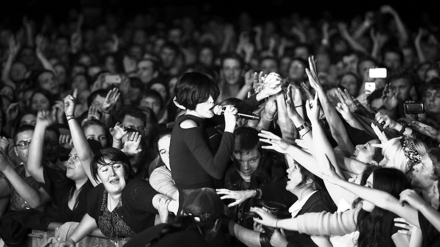 Hayley Mary from the Jezabels singing in the crowd in 2016