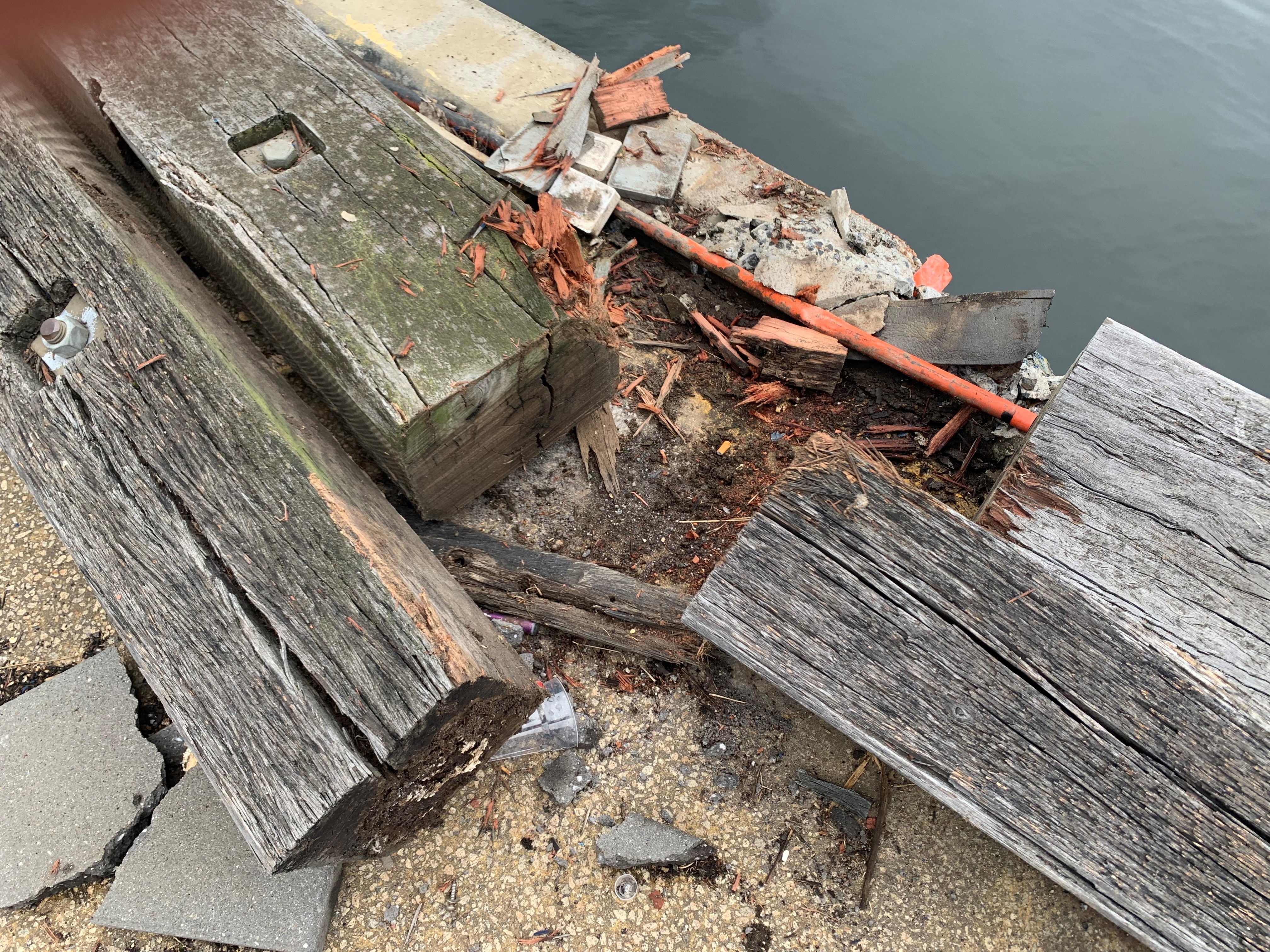 Broken wood at a pier.
