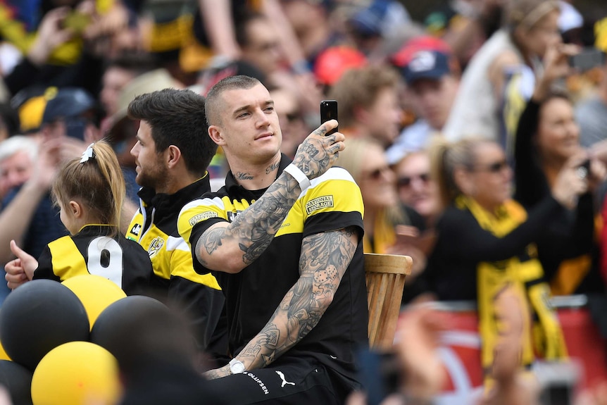 Richmond Tigers captain Trent Cotchin (left) and Dustin Martin at the grand final parade.