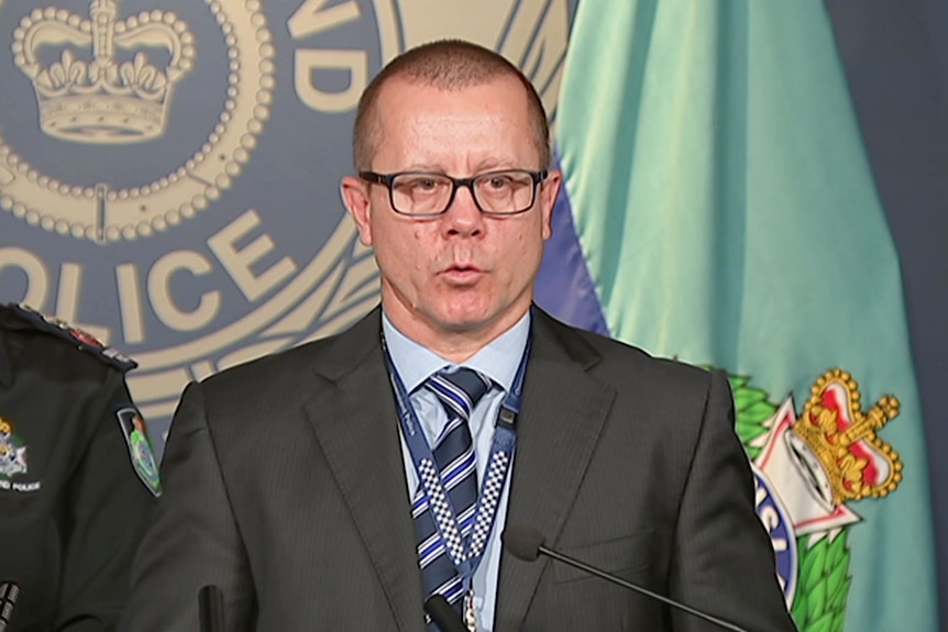 Craig Morrow, head of the homicide unit, speaks at a media conference in Brisbane.