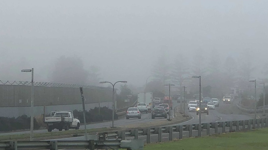 Heavy fog blankets above a busy Adelaide road on Monday, June 4, 2018.