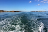 View from the back of a boat of Flying Foam Passage off the coast of Karratha.