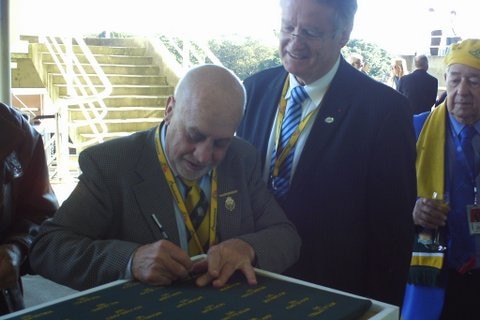 Ken Catchpole signing the Jersey at the Australia France Rugby Test at Allianz Stadium in Sydney in 2014.