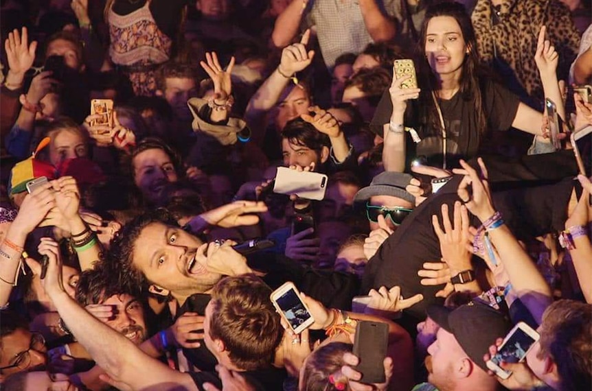 Dave Le'aupepe crowdsurfing at Gang of Youths' Amphitheatre set at Splendour In The Grass 2018