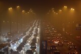 Vehicles drive on the Third Ring Road on a very hazy winter day in Beijing January 12, 2013.