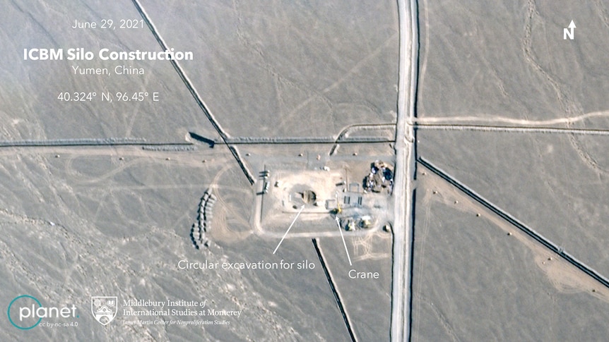 A satellite image of a construction site in a desert 