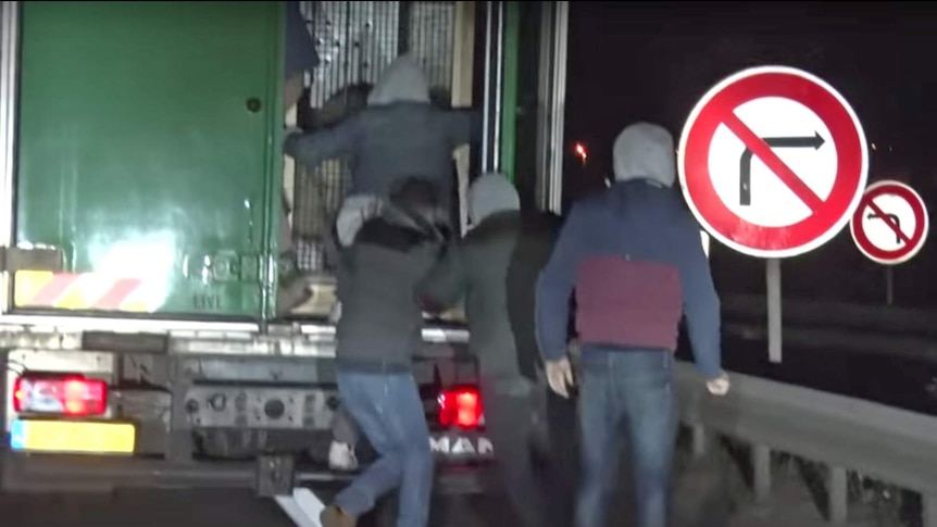 The men boarded the truck as it made its way from Calais to England.