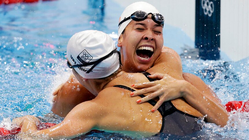 Ranomi Kromowidjojo and Marleen Veldhuis celebrate after winning gold and bronze respectively.