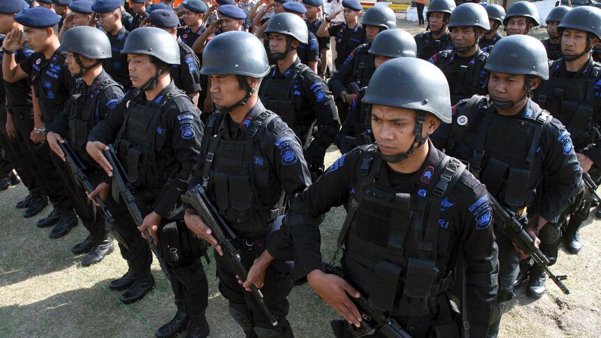 Indonesian police listen to instructions ahead of the tenth anniversary of the Bali bombing.