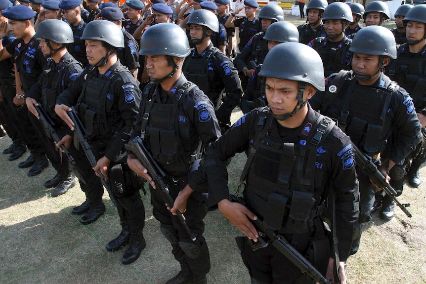 Indonesian police listen to instructions ahead of the tenth anniversary of the Bali bombing.