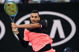 Nick Kyrgios in action against Rogerio Dutra Silva during round one, on day one of the Australian Open.