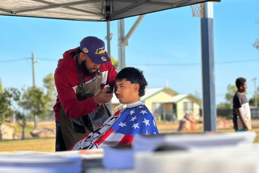 A young man gets a haircut 